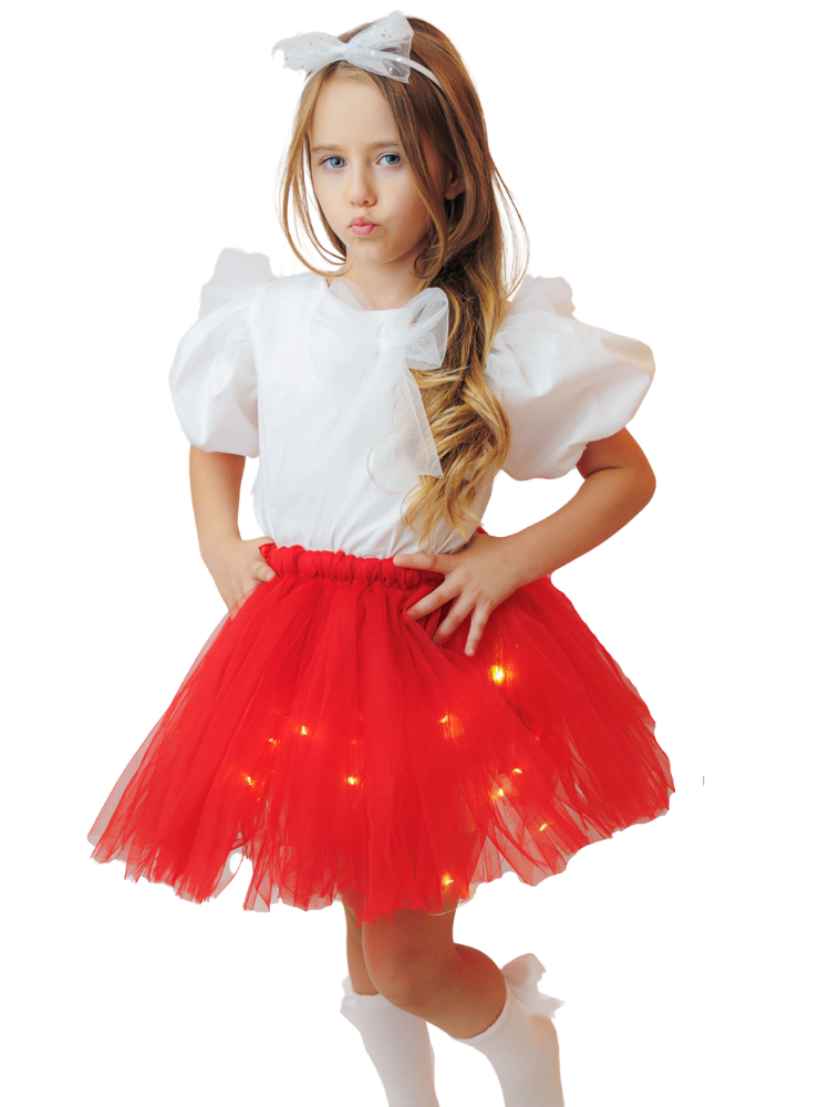 Fustița cu Luminițe, Roșie