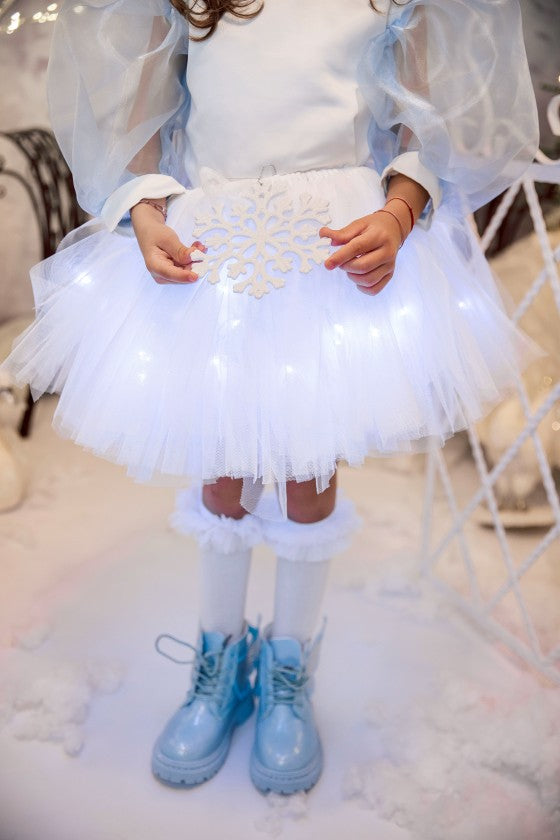 Fustița cu Luminițe, Fulg de Nea